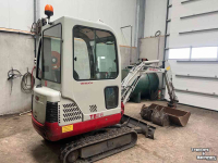 Rupskraan / Graafmachine op rupsen Takeuchi TB016 met machinetrailer