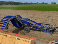 Uienrooier SU-Tech uienlader met doorvalmat