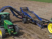 Uienrooier SU-Tech uienlader met doorvalmat