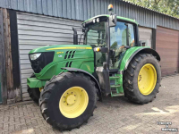 Tractor / Trekker John Deere 6115M tractor TLS voorasvering, airco, trekker 6115 M traktor