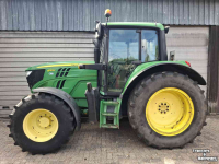 Tractor / Trekker John Deere 6115M tractor TLS voorasvering, airco, trekker 6115 M traktor