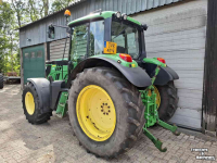 Tractor / Trekker John Deere 6115M tractor TLS voorasvering, airco, trekker 6115 M traktor