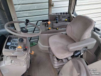 Tractor / Trekker John Deere 6115M tractor TLS voorasvering, airco, trekker 6115 M traktor