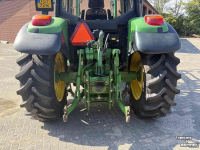 Tractor / Trekker John Deere 6020 met frontlader