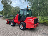 Telescopische Shovel / Wiellader / Kniklader Schäffer 570T Telelader shovel + pelikaanbak & vorken