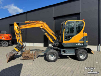 Bandenkraan / Graafmachine op wielen Hyundai 55W-9