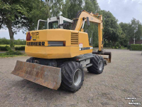 Bandenkraan / Graafmachine op wielen Liebherr 312 banden kraan graafmachine