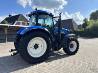 Tractor / Trekker New Holland T7030 PowerCommand. Fronthef, Vooras vering, 40km.