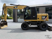 Bandenkraan / Graafmachine op wielen Caterpillar M313D