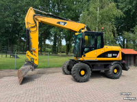 Bandenkraan / Graafmachine op wielen Caterpillar m313d Mobiele kraan