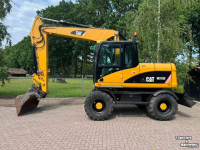 Bandenkraan / Graafmachine op wielen Caterpillar m313d Mobiele kraan
