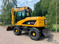 Bandenkraan / Graafmachine op wielen Caterpillar m313d Mobiele kraan