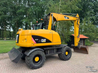 Bandenkraan / Graafmachine op wielen Caterpillar m313d Mobiele kraan