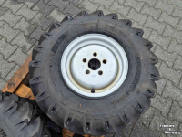 Wielen, Banden, Velgen & Afstandsringen BKT 4x BKT 7.00-12 met velg