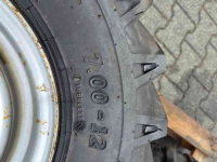 Wielen, Banden, Velgen & Afstandsringen BKT 4x BKT 7.00-12 met velg