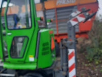Bandenkraan / Graafmachine op wielen Hansa APZ331 Kraan