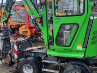 Bandenkraan / Graafmachine op wielen Hansa APZ331 Kraan