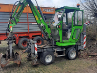 Bandenkraan / Graafmachine op wielen Hansa APZ331 Kraan