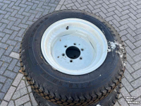 Wielen, Banden, Velgen & Afstandsringen New Holland 33x12.50-16.5 +23x8.50-12 Boomer 25 gazon banden
