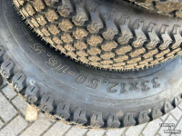 Wielen, Banden, Velgen & Afstandsringen New Holland 33x12.50-16.5 +23x8.50-12 Boomer 25 gazon banden