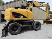Bandenkraan / Graafmachine op wielen Caterpillar M313D