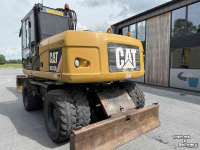 Bandenkraan / Graafmachine op wielen Caterpillar M313D