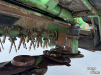 Maaier John Deere 328 DISC