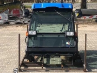 Zitmaaier New Holland Mauser cabine