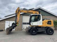 Bandenkraan / Graafmachine op wielen Liebherr A916 met draaikantelstuk