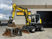 Bandenkraan / Graafmachine op wielen Wacker Neuson EW 100 Airco Powertilt 3 Bakken Palletvork  Steunpoten