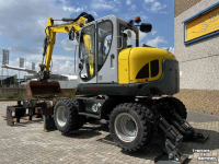 Bandenkraan / Graafmachine op wielen Wacker Neuson EW 100 Airco Powertilt 3 Bakken Palletvork  Steunpoten