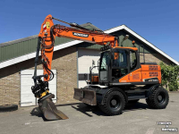 Bandenkraan / Graafmachine op wielen Doosan DX140w-5 met draaikantelstuk