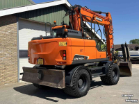 Bandenkraan / Graafmachine op wielen Doosan DX140w-5 met draaikantelstuk