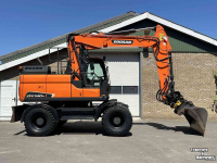 Bandenkraan / Graafmachine op wielen Doosan DX140w-5 met draaikantelstuk