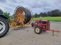 Stationare motor/pomp set Emergo Haspel met Nelson sproeier en MwM motorpomp